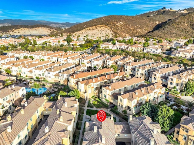 aerial view featuring a residential view and a mountain view