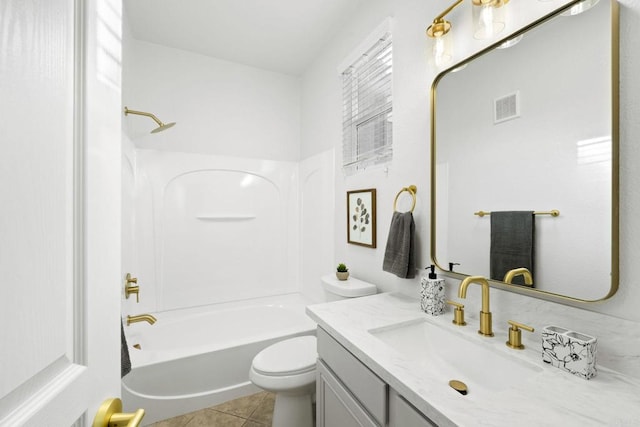 bathroom featuring bathtub / shower combination, visible vents, toilet, vanity, and tile patterned floors