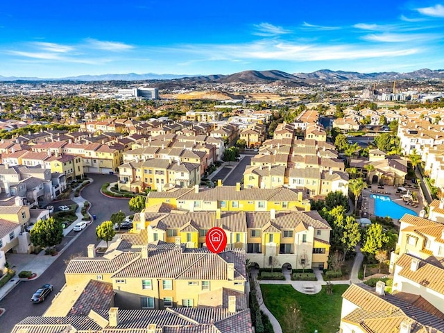 aerial view featuring a residential view and a mountain view