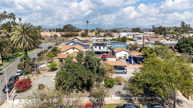 birds eye view of property with a residential view