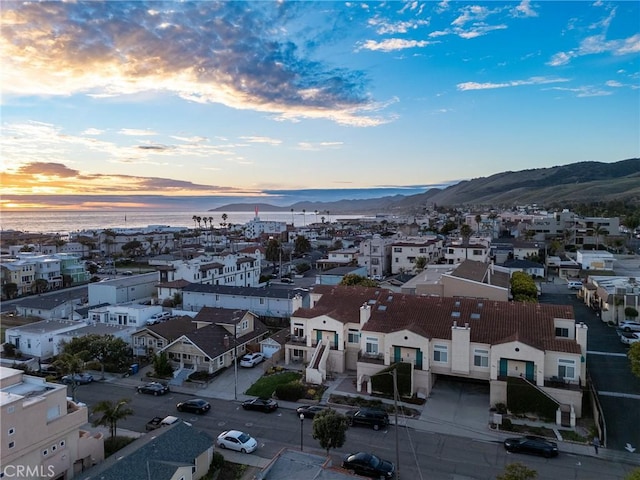 aerial view with a residential view and a water and mountain view