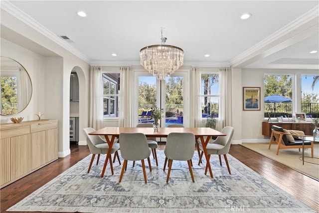 dining space featuring recessed lighting, wood finished floors, baseboards, and ornamental molding