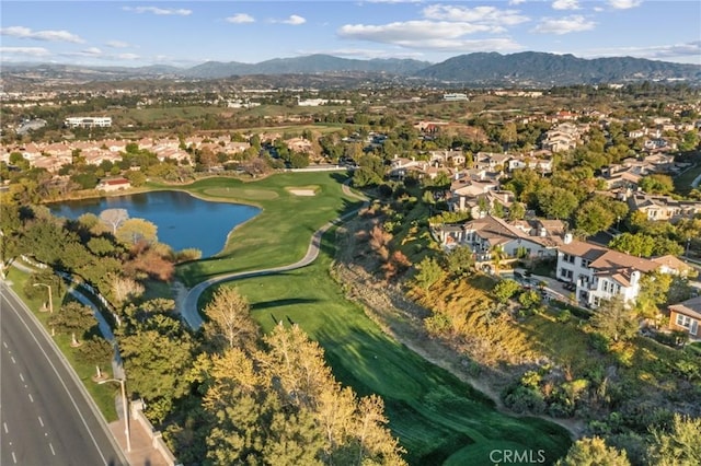 bird's eye view with a residential view and a water and mountain view