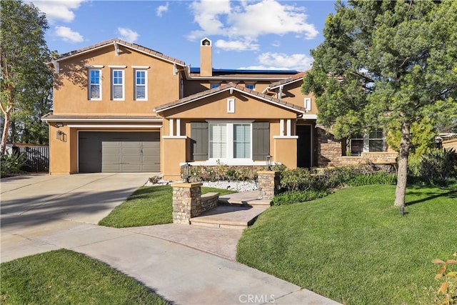 view of front of house featuring stucco siding, a front lawn, concrete driveway, a garage, and solar panels