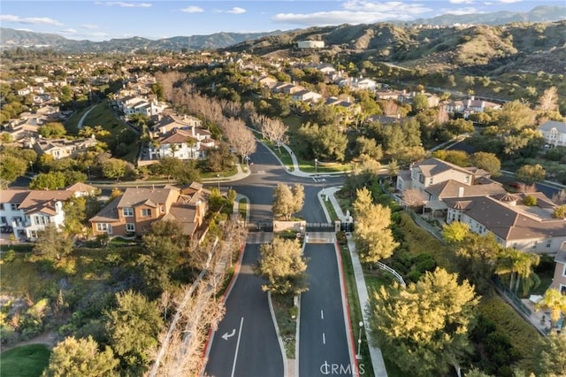 aerial view with a mountain view and a residential view