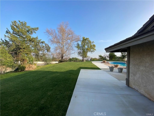 view of yard with a patio area