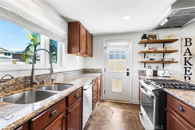 kitchen featuring a sink, open shelves, appliances with stainless steel finishes, light stone countertops, and extractor fan