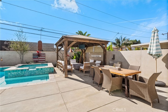 view of patio with outdoor dining space, an outdoor living space, a fenced backyard, and a pool with connected hot tub