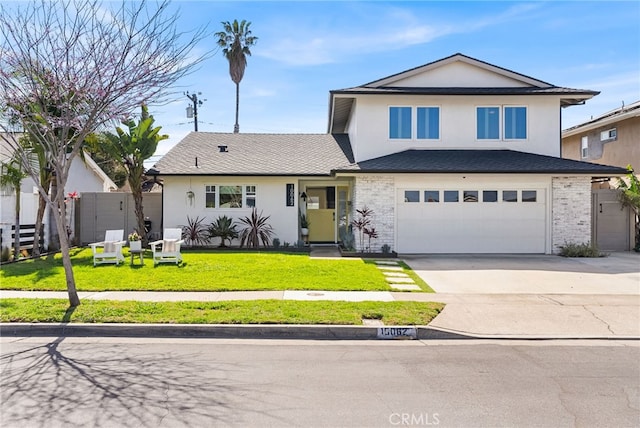 traditional-style house with fence, driveway, an attached garage, stucco siding, and a front lawn