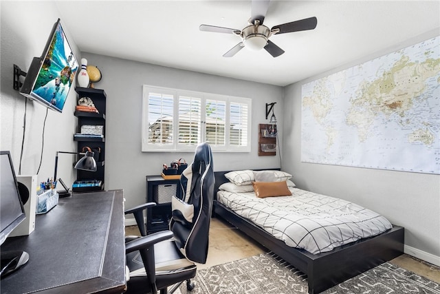 bedroom with baseboards and ceiling fan