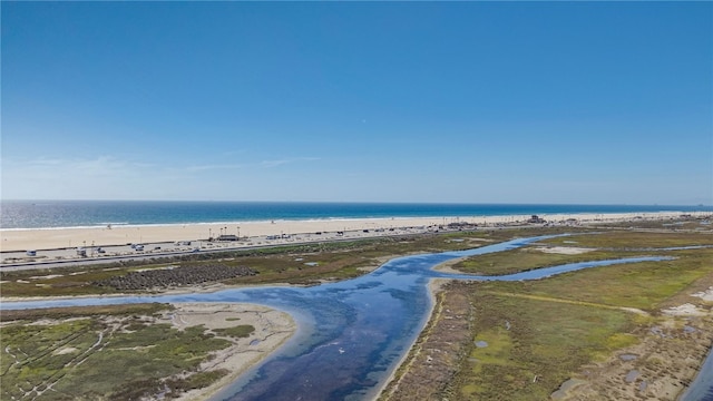 aerial view with a beach view and a water view