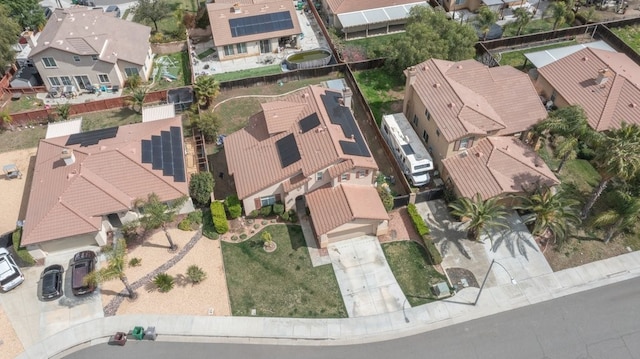 birds eye view of property with a residential view