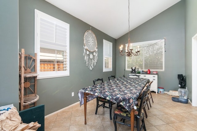 dining area featuring lofted ceiling, light tile patterned floors, baseboards, and an inviting chandelier