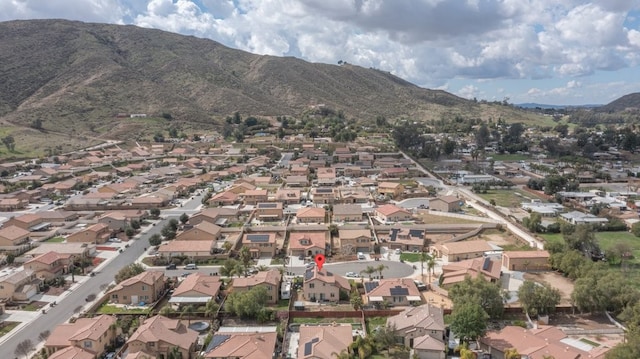 bird's eye view featuring a residential view and a mountain view