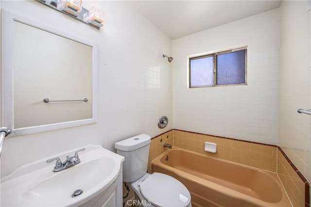 full bath featuring toilet, shower / washtub combination, and vanity