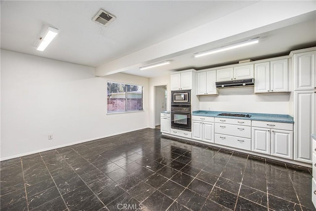 kitchen with stainless steel appliances, white cabinetry, visible vents, and under cabinet range hood