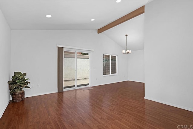 empty room with vaulted ceiling with beams, baseboards, wood finished floors, and a notable chandelier