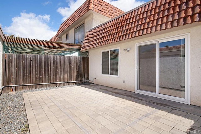 view of patio with fence