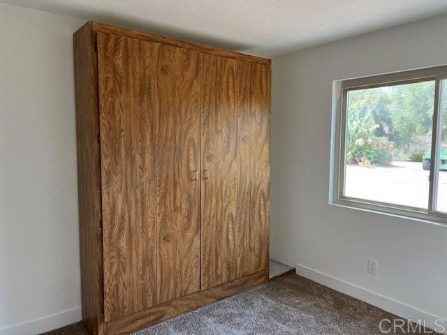 9946 Nutby Ln, Escondido, CA 92026 - unfurnished bedroom featuring carpet and baseboards