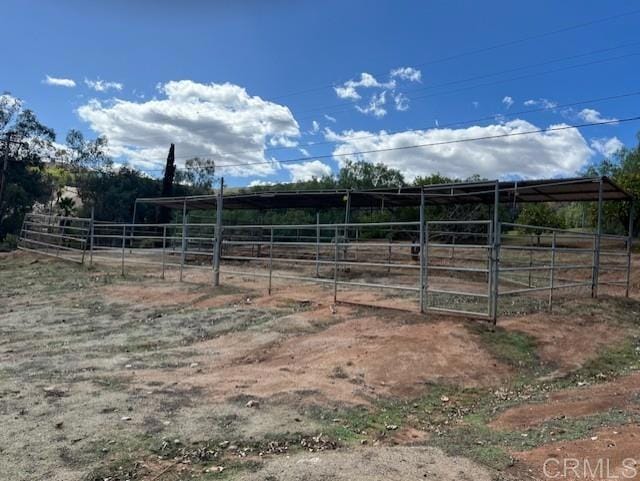 9946 Nutby Ln, Escondido, CA 92026 - view of yard featuring an exterior structure, an outbuilding, and a view of countryside