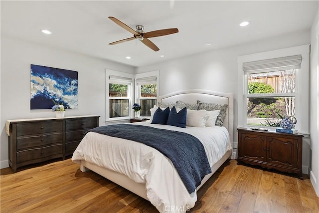 bedroom featuring recessed lighting, light wood-style floors, and ceiling fan