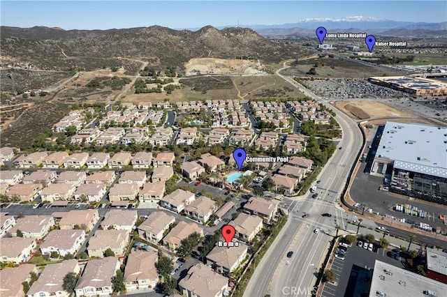 aerial view featuring a mountain view and a residential view