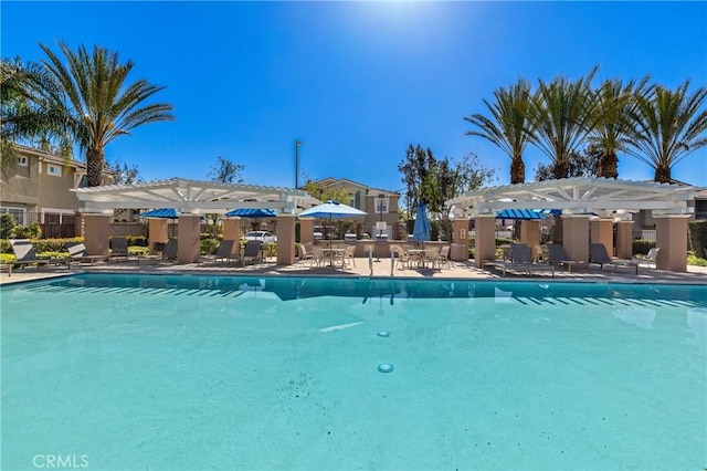 community pool featuring a patio and a pergola