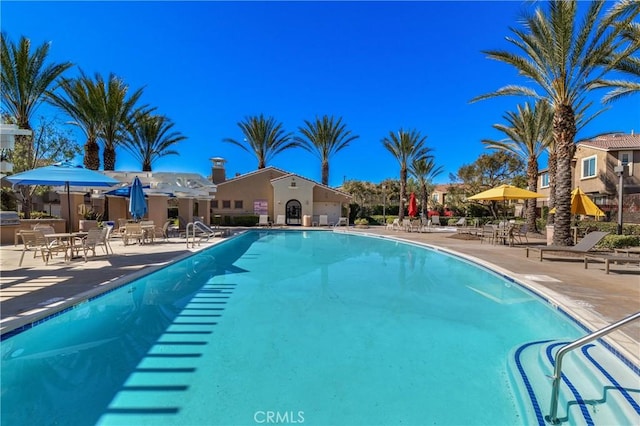 pool with a patio