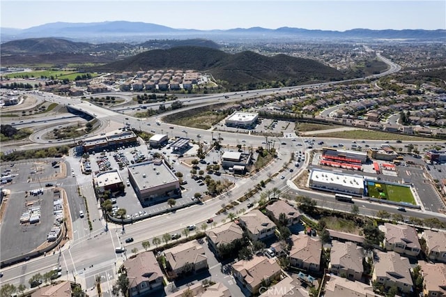 birds eye view of property featuring a mountain view