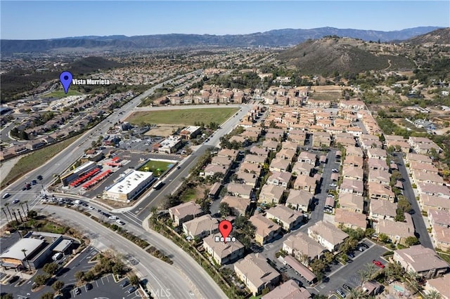 birds eye view of property featuring a residential view and a mountain view