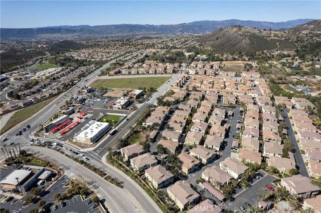 aerial view featuring a mountain view and a residential view