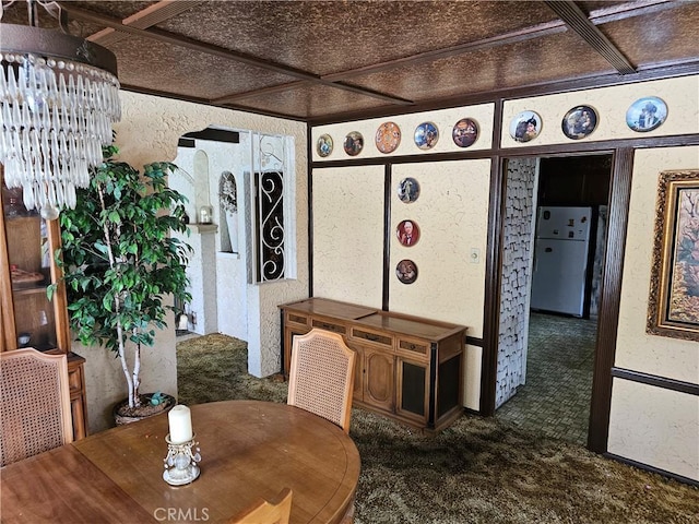 carpeted dining space with a chandelier