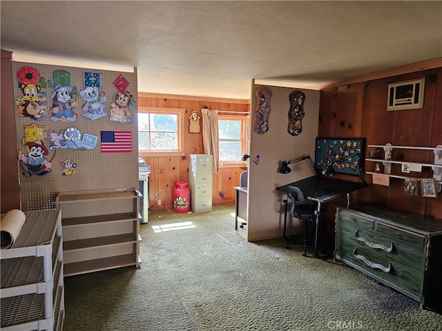 bedroom featuring carpet floors and wood walls