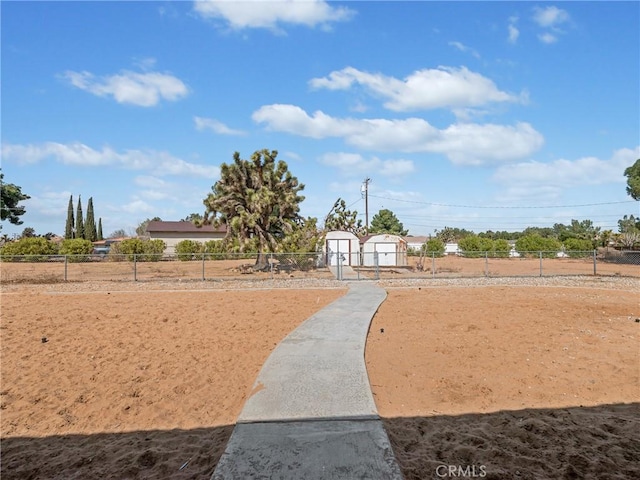 20312 Eyota Rd, Apple Valley, CA 92308 - view of home's community with an outbuilding and fence