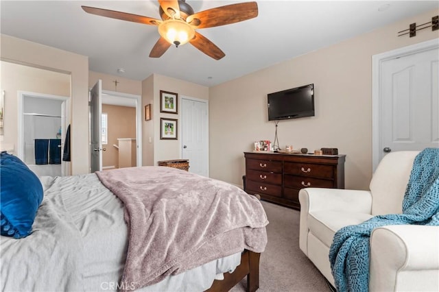 bedroom with carpet and a ceiling fan