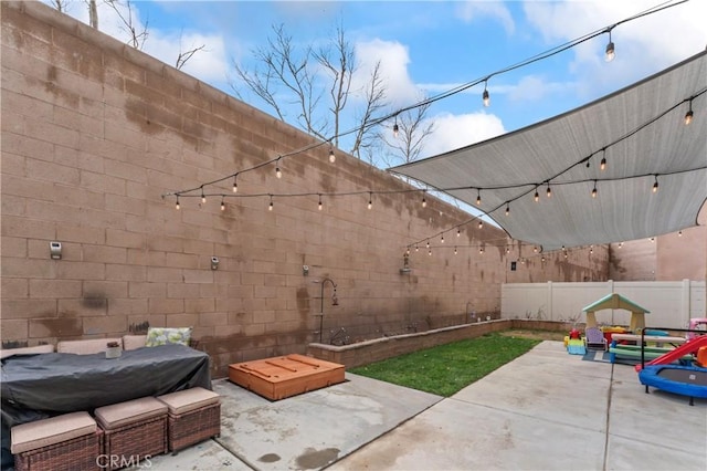 view of patio featuring a fenced backyard