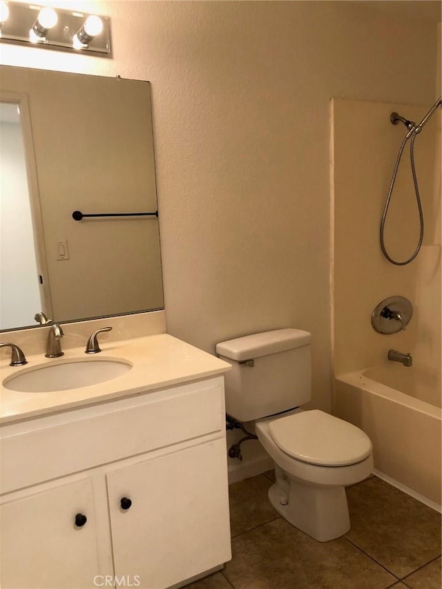 full bathroom with toilet, bathing tub / shower combination, vanity, and tile patterned floors