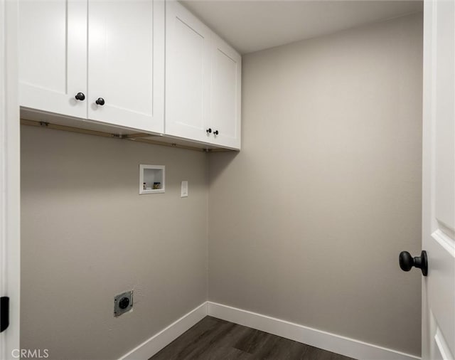 laundry area featuring dark wood-style flooring, washer hookup, baseboards, cabinet space, and electric dryer hookup