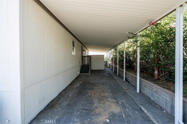 exterior space with a carport