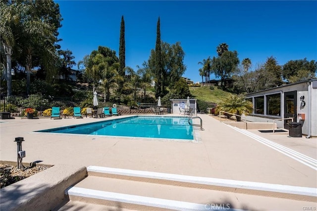 pool with a patio