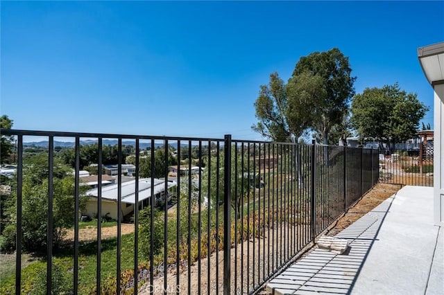 view of gate with fence