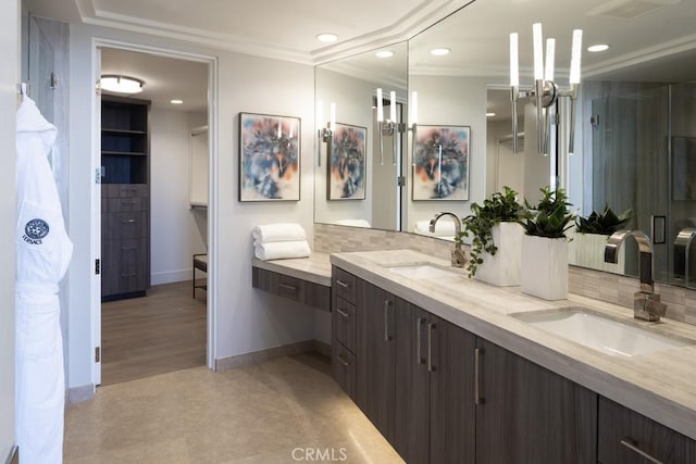 full bathroom featuring recessed lighting, a sink, backsplash, and double vanity