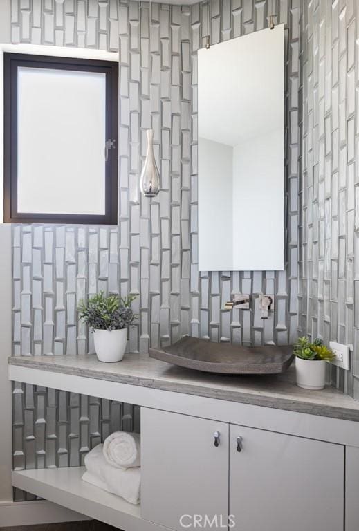 interior space featuring backsplash