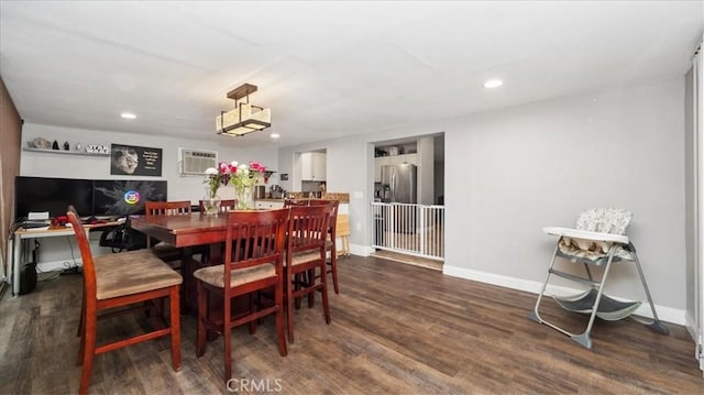 dining area featuring dark wood-style floors, recessed lighting, baseboards, and a wall mounted air conditioner