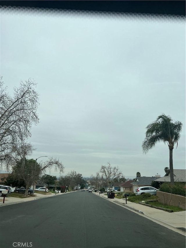 view of street with curbs and sidewalks