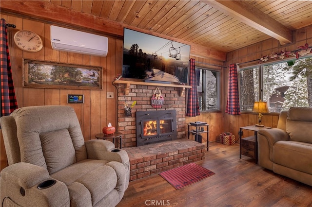 living room with a wall mounted AC, a brick fireplace, wooden walls, wooden ceiling, and beamed ceiling