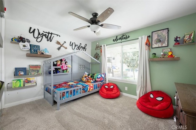 bedroom featuring carpet flooring, a ceiling fan, and baseboards