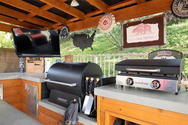 view of patio / terrace featuring area for grilling and an outdoor kitchen