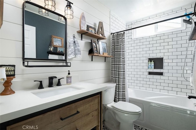 bathroom with vanity, toilet, and shower / tub combo with curtain