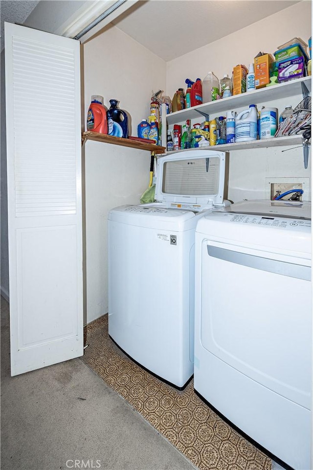 laundry room featuring laundry area and washing machine and dryer